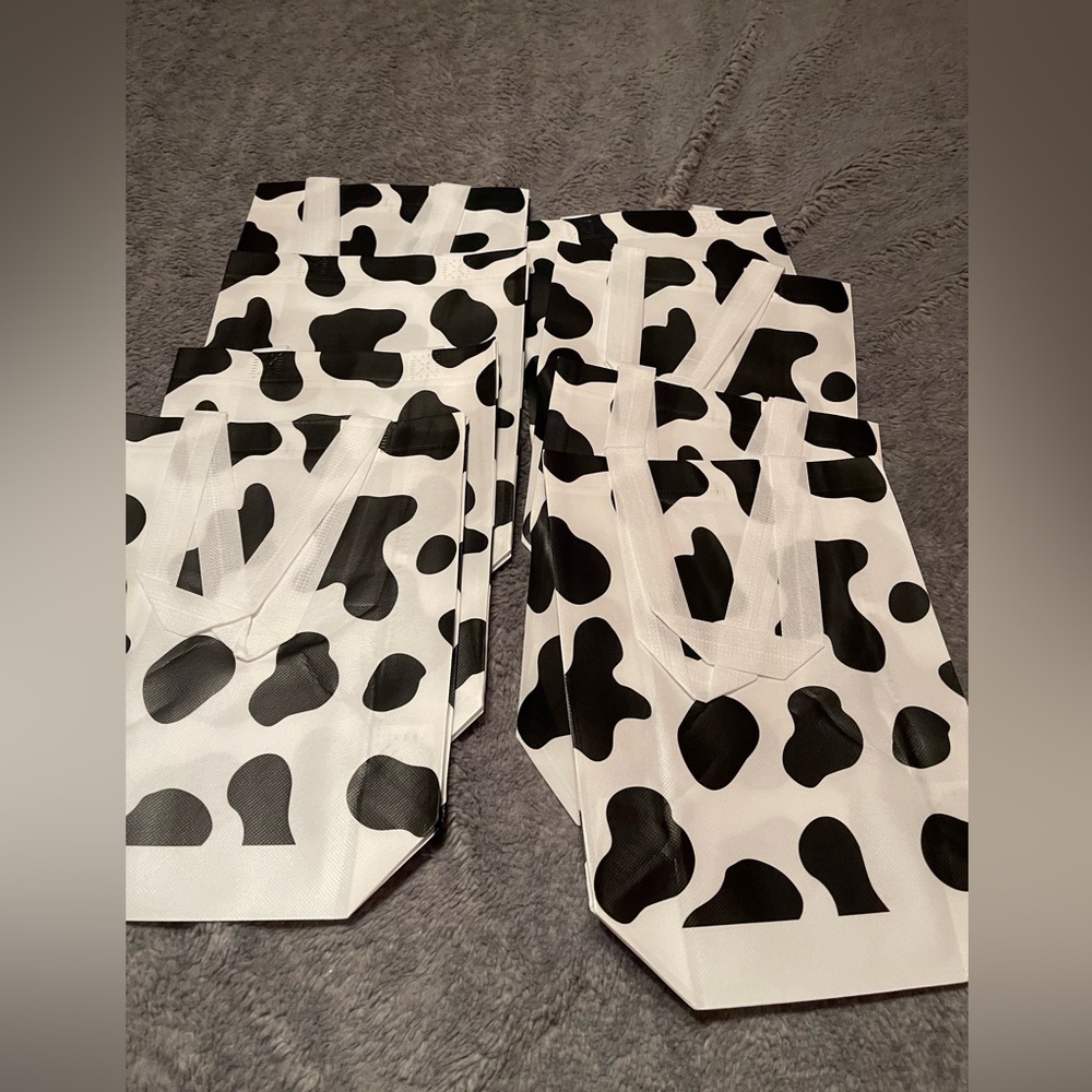 New vinyl cow print party bags eight total 8 1/2 x 11  3 in wide